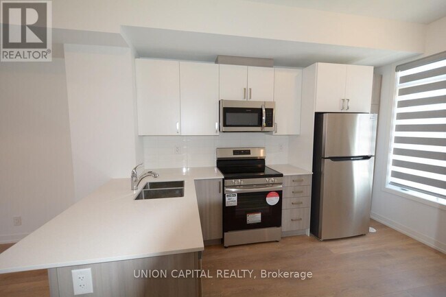 Photo du bâtiment - 25 Case Ootes Dr