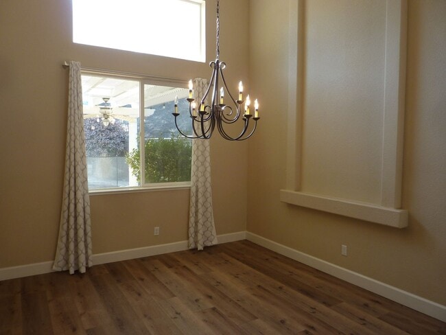 Building Photo - Stunning Single-Family House with a Backyard Oasis in a exclusive Gated Community of Serrano