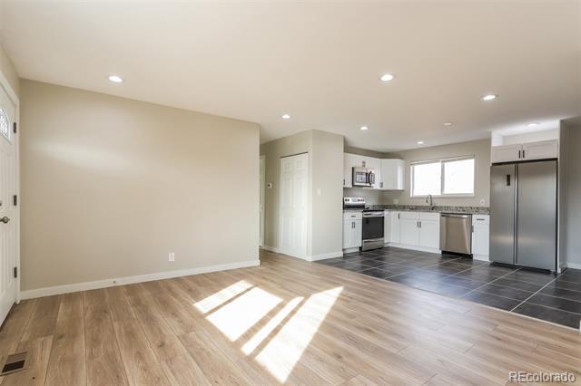 Building Photo - 12345 E 55th Ave