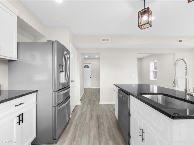 Building Photo - 3 br, 2 bath Townhome - 4609 Wilkens Avenue