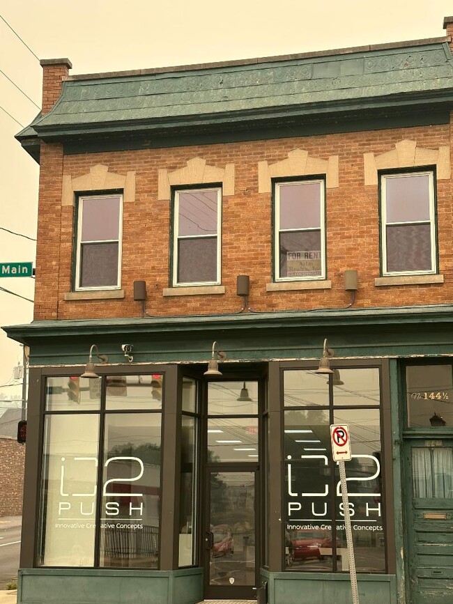 Front corner lot - 144 S Main St