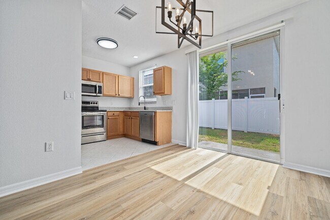 Foto del edificio - "Charming 3-Bed Townhouse with Granite Elegance in Ruskin - 1366 Sq Ft of Comfort!"