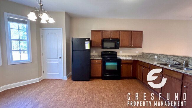 Foto del edificio - 2 BED, 2 BATH TOWNHOME WITH GARAGE AVAILABLE NOW!!!!!!!!!