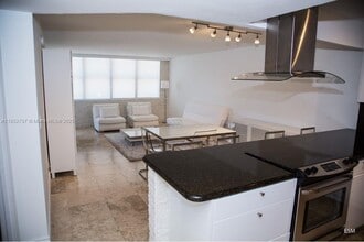 Building Photo - 6039 Collins Ave