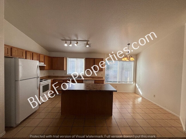 Building Photo - 6334 S Acacia Desert Ave