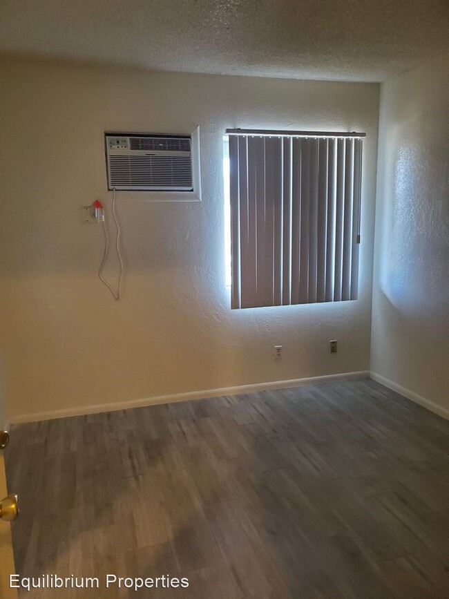 Building Photo - 6590 E Golf Links Rd