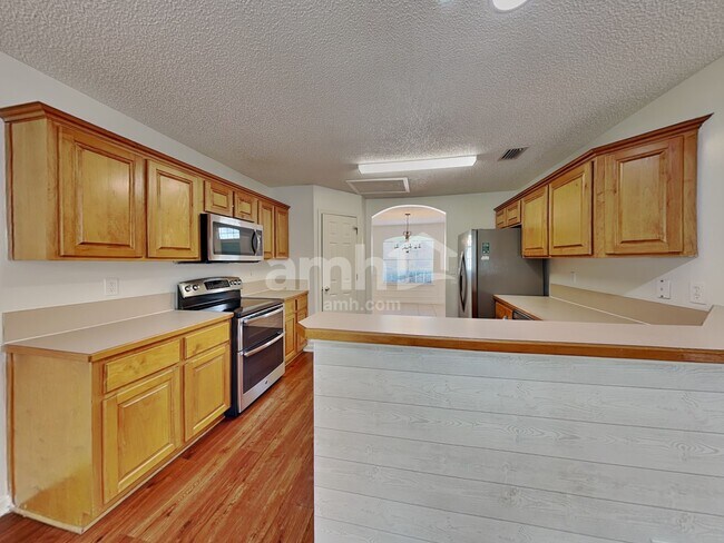 Foto del edificio - 3127 Majestic Oaks Ln