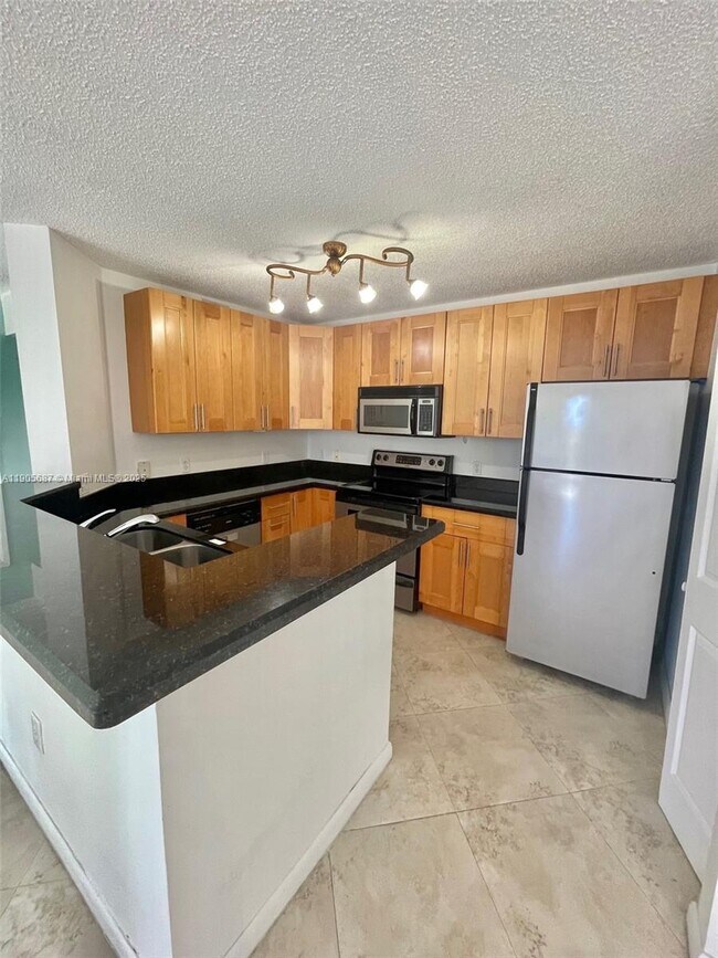 Foto del edificio - 19999 E Country Club Dr