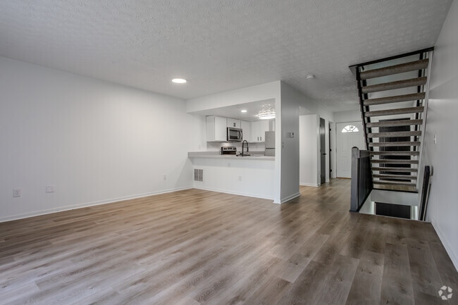 2 BR, 2.5 BA - 1,120 SF (Remodeled Unit) - living room - Oak Bend Commons