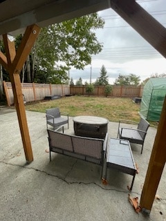 Covered patio view of backyard - 803 N 122nd St, Townhome