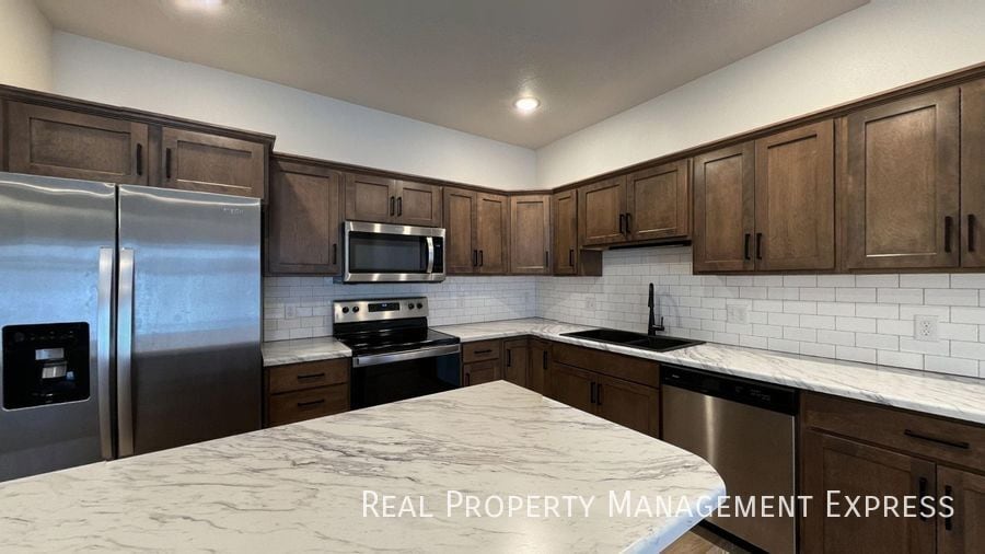 Primary Photo - Modern Luxury: 3BR Townhome with Stylish Finishes, Spacious Interiors, and Attached Garage