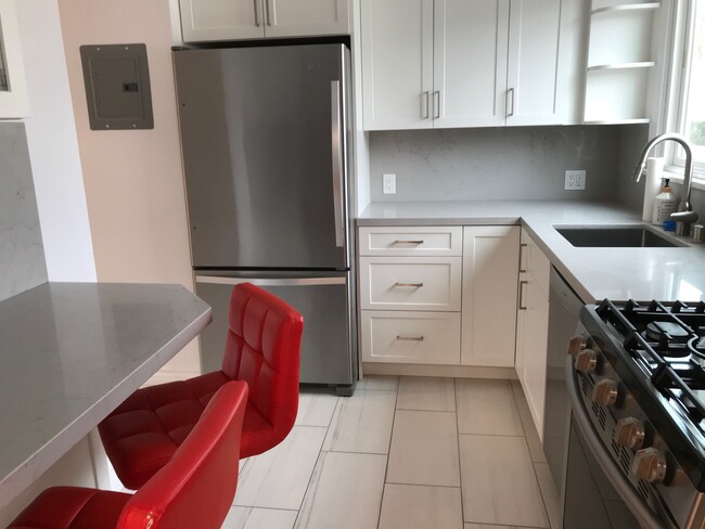 Kitchen view from Dining Area - 144 S Roxbury Dr