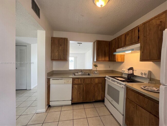 Building Photo - 8720 N Sherman Cir