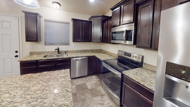 Building Photo - 3-Bed, 2-Bath single family home with an a...