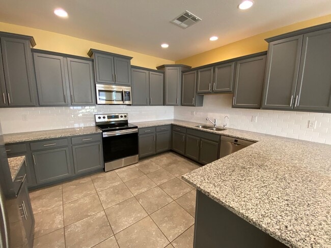 Building Photo - 3-Bed Home with Community Pool Access, Low-Maintenance Yard, and Upgraded Kitchen, Featuring Gran...