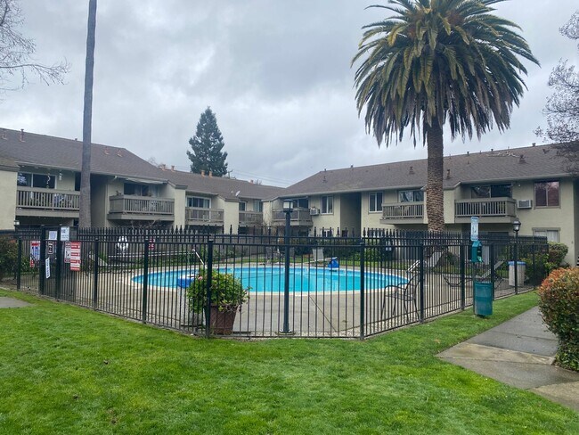 Building Photo - A sparkling upstairs single-level condo at...