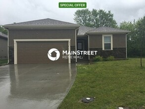 Building Photo - 213 NE Kim Ct