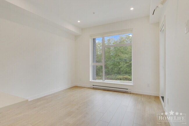 Photo du bâtiment - Brand New 1 Bed + Den, 1 Bath Condo for Rent at Viva in Surrey