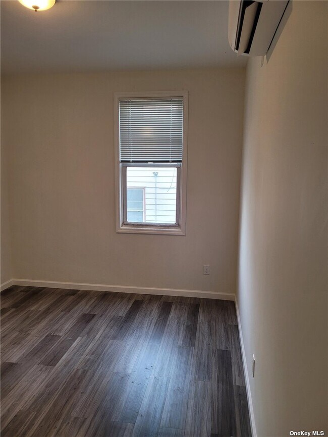 Building Photo - 59-57-59-56 56th Ave