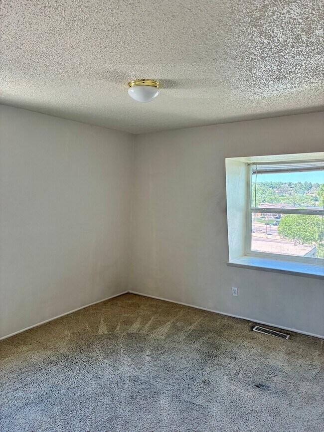 Foto del edificio - 3035 E Fountain Blvd