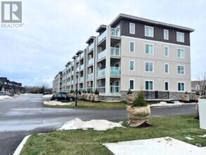 Building Photo - 403-417 Spooner Cres