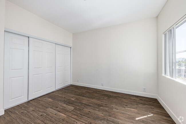 2BR, 1BA - 800SF - Primary Bedroom - Magnolia Villas