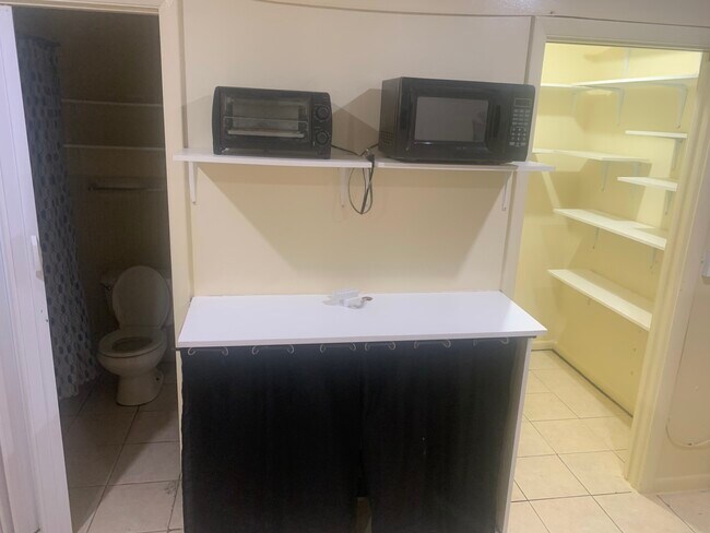 Counter with portable stove - 2721 SW 8th St