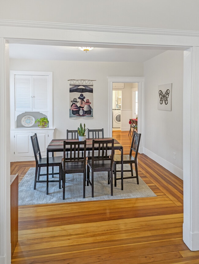 Dining room into kitchen with south-facing windows - 22 Reed St