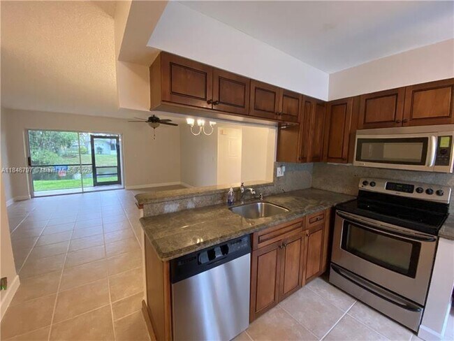 Building Photo - 713 Gardens Dr