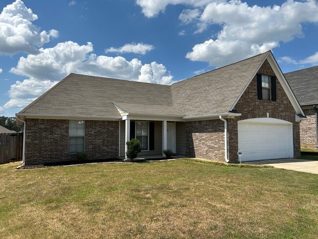 Photo - SOUTHAVEN STUNNER! 3BR/2BA | Vaulted Ceilings & Fireplace | Fenced Yard! House