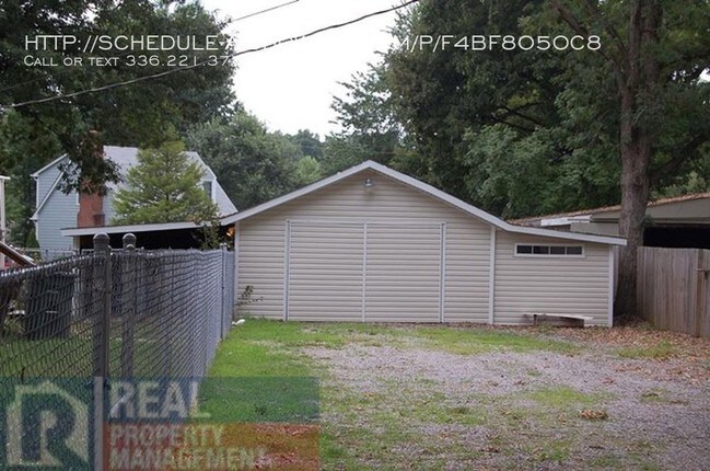 Building Photo - Fenced yard and powered workshop!