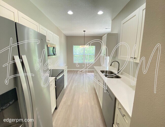 Foto del edificio - NEW Construction Condo