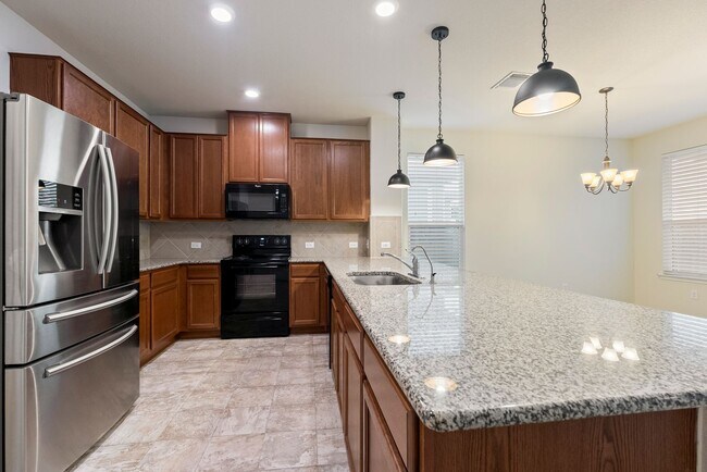 Building Photo - Modern Comfort Meets Texas Charm in Manor