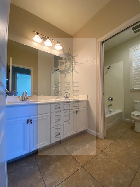 Foto del edificio - 5849 Poppy Shores Way