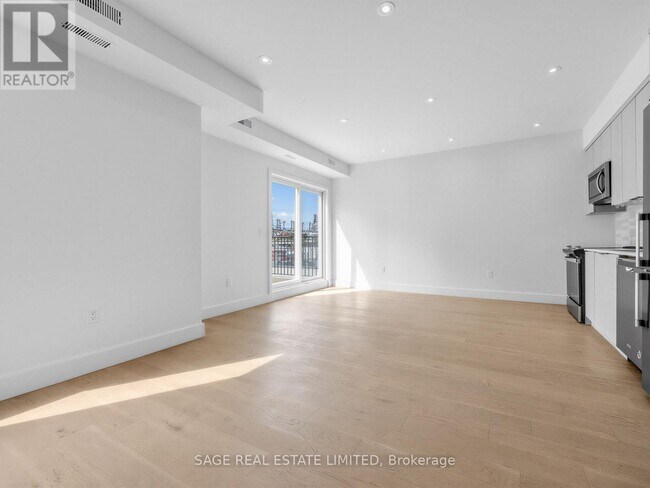 Photo du bâtiment - 909 Castlefield Ave