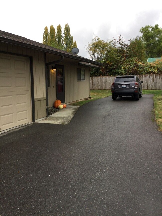 Building Photo - Updated side by side duplex with an attach...