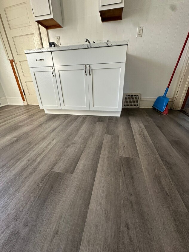 New kitchen floor and cabs - 831 Georgia Ave