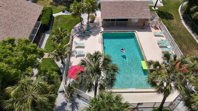 Foto del edificio - 5037 Village Garden Dr