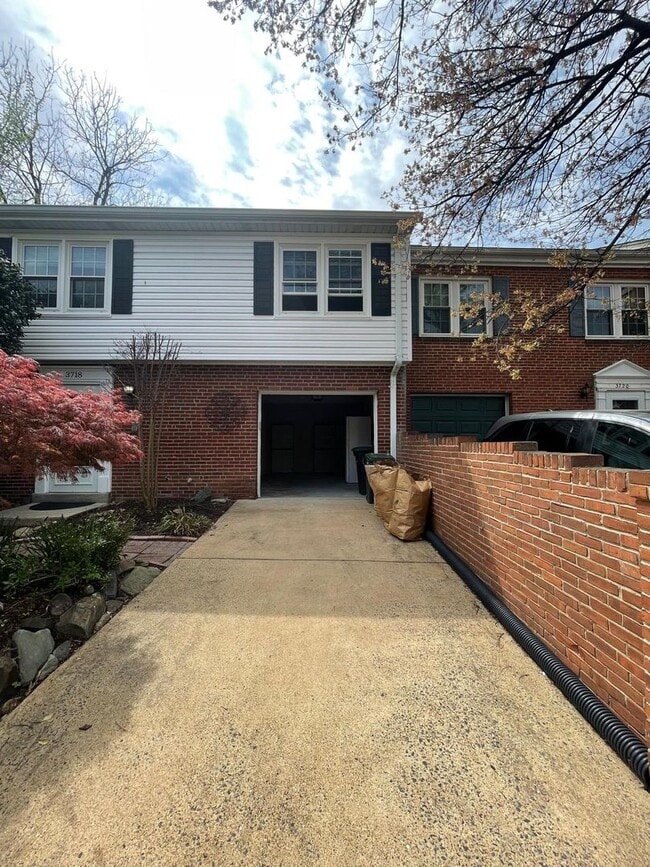 Building Photo - A fully updated Four Bedroom, Three and On...
