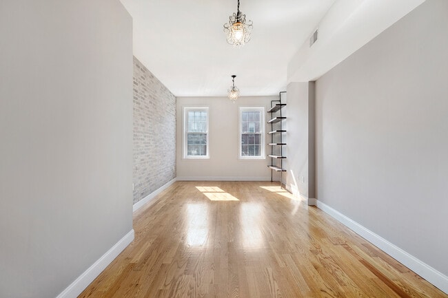 Primary bedroom / living room - 149 Webster Ave