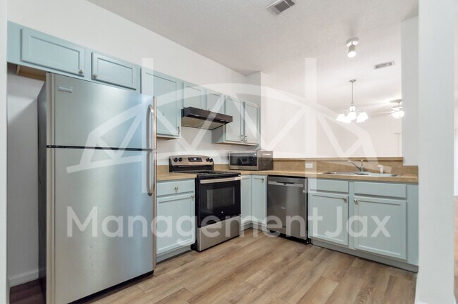 Foto del edificio - 4811 Playpen Dr