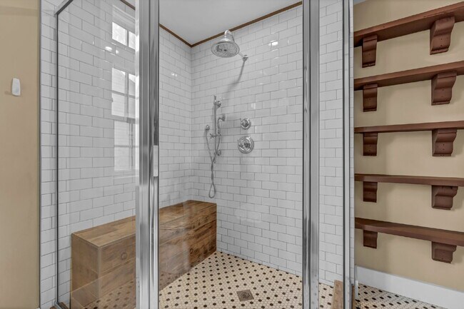 Building Photo - Furnished 1-Bedroom Lower Apartment on Main St