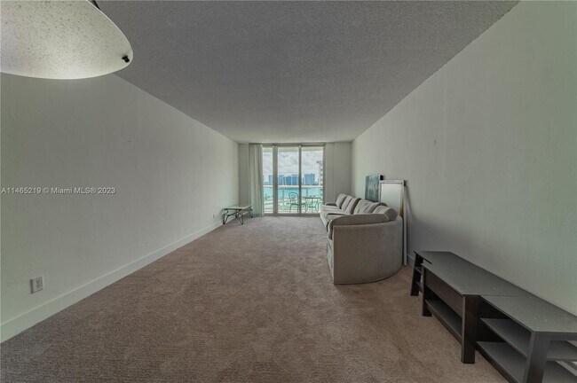 Building Photo - 19380 Collins Ave