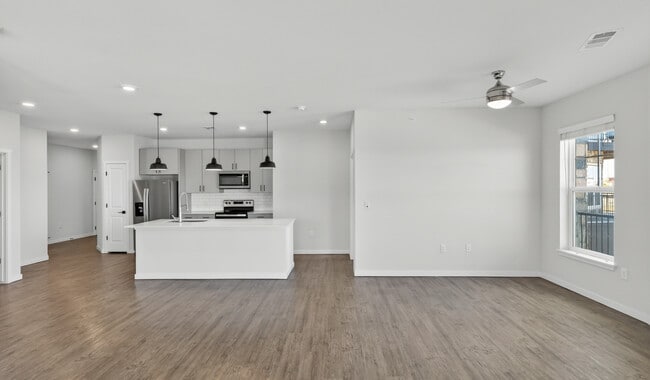 Spacious living rooms designed for comfort and style. - Grant Row Lofts