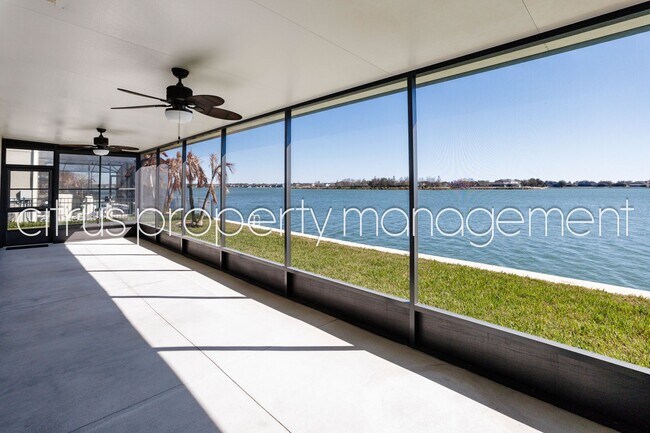 Building Photo - Stunning Double Waterfront 4/3 Home with Dock and Electric Boat Lift