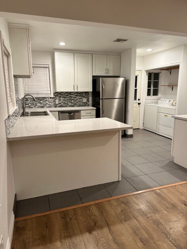 Kitchen & Laundry - 18933 Runnymede St