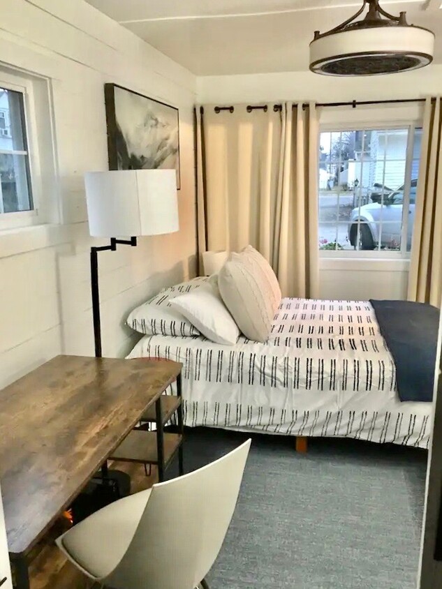 Bedroom with new queen bed with blackout curtains - 510 Auburndale Ave