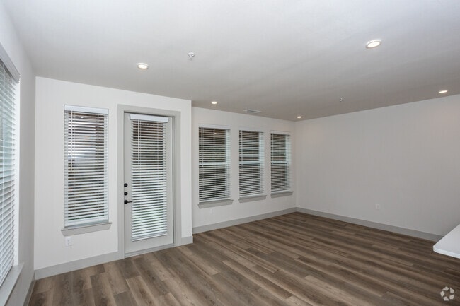 2BR, 2.5BA - 1,532SF - Living Room - Everbloom