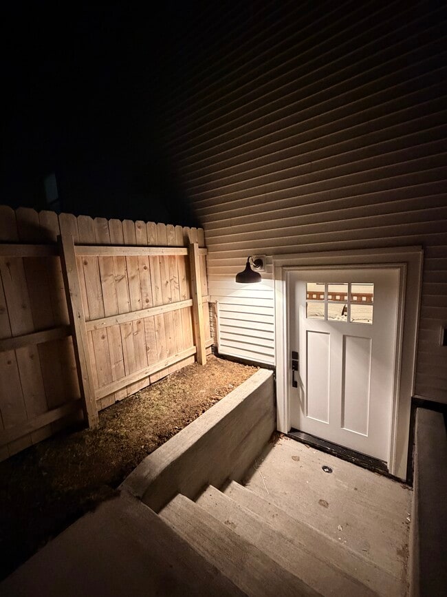 Apartment entrance behind fence - 4434 Honey Bee Rdg