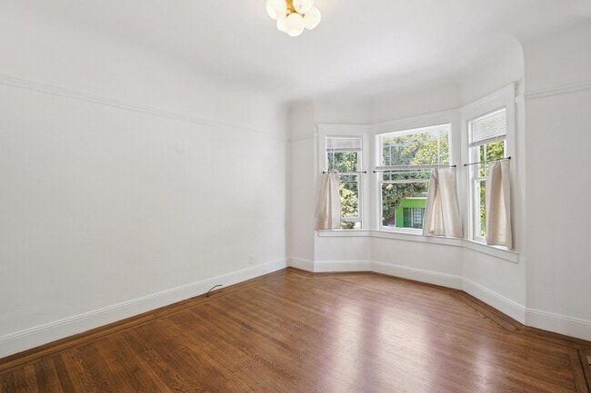 Building Photo - 1431 Quesada Ave